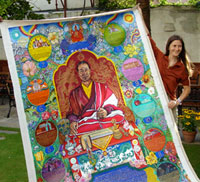 ane Vance (M.A. English '83) with Amchi Tsampa Ngawang's Tibetan lineage painting