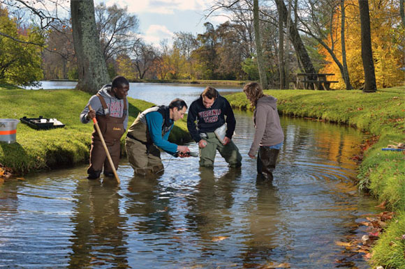 Professor Stephen Schoenholtz and students at Duck Pond