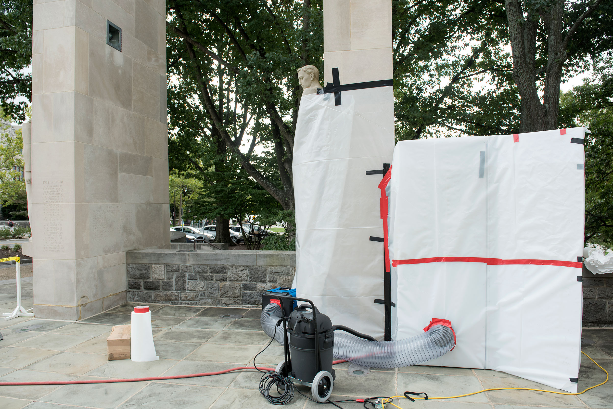 Facilities constructed a booth around the work to protect the surrounding area and adjacent pylon.