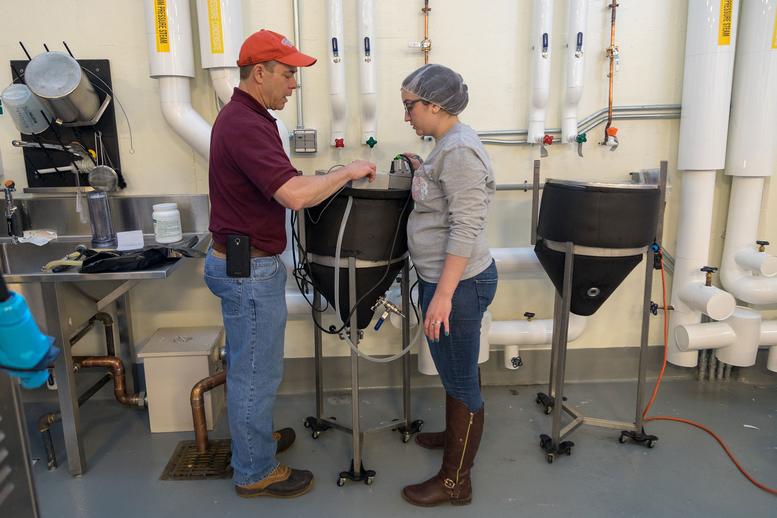 Herbert Bruce explains the operations of the brewhouse’s fermentation temperature control system