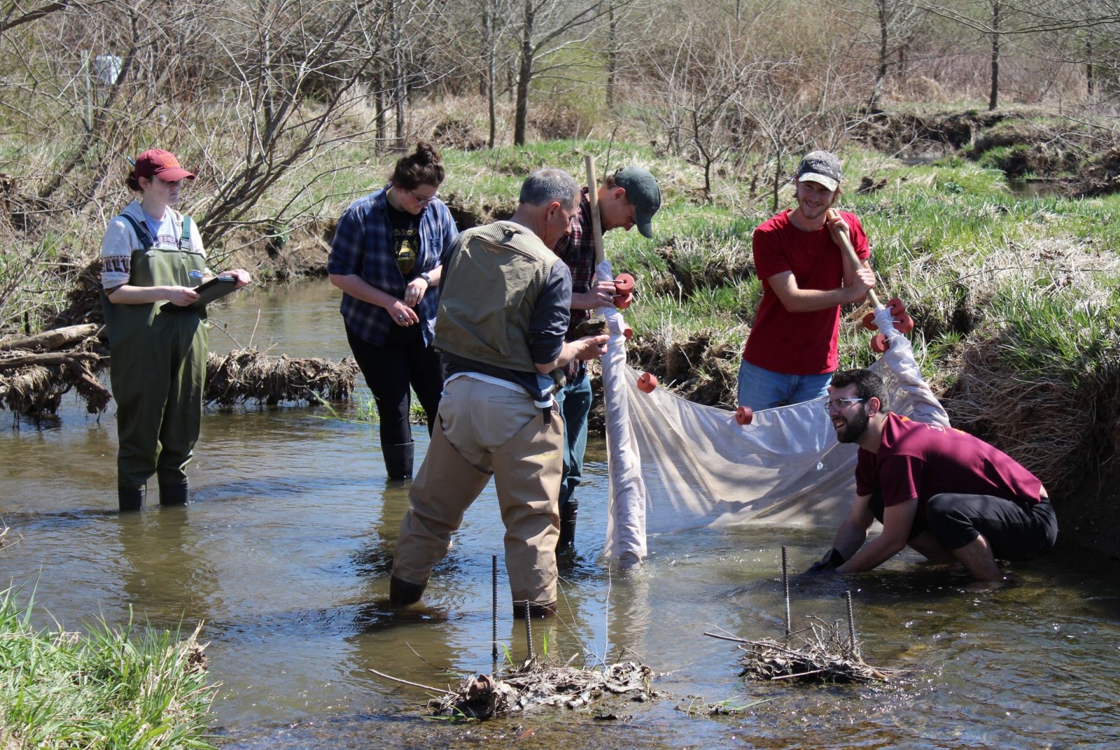 Students in the creek