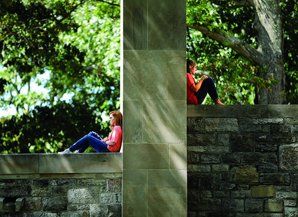 people sitting on Chapel wall