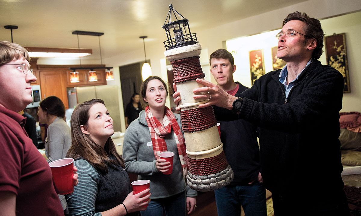 Marc Edwards receiving a lighthouse award from his students