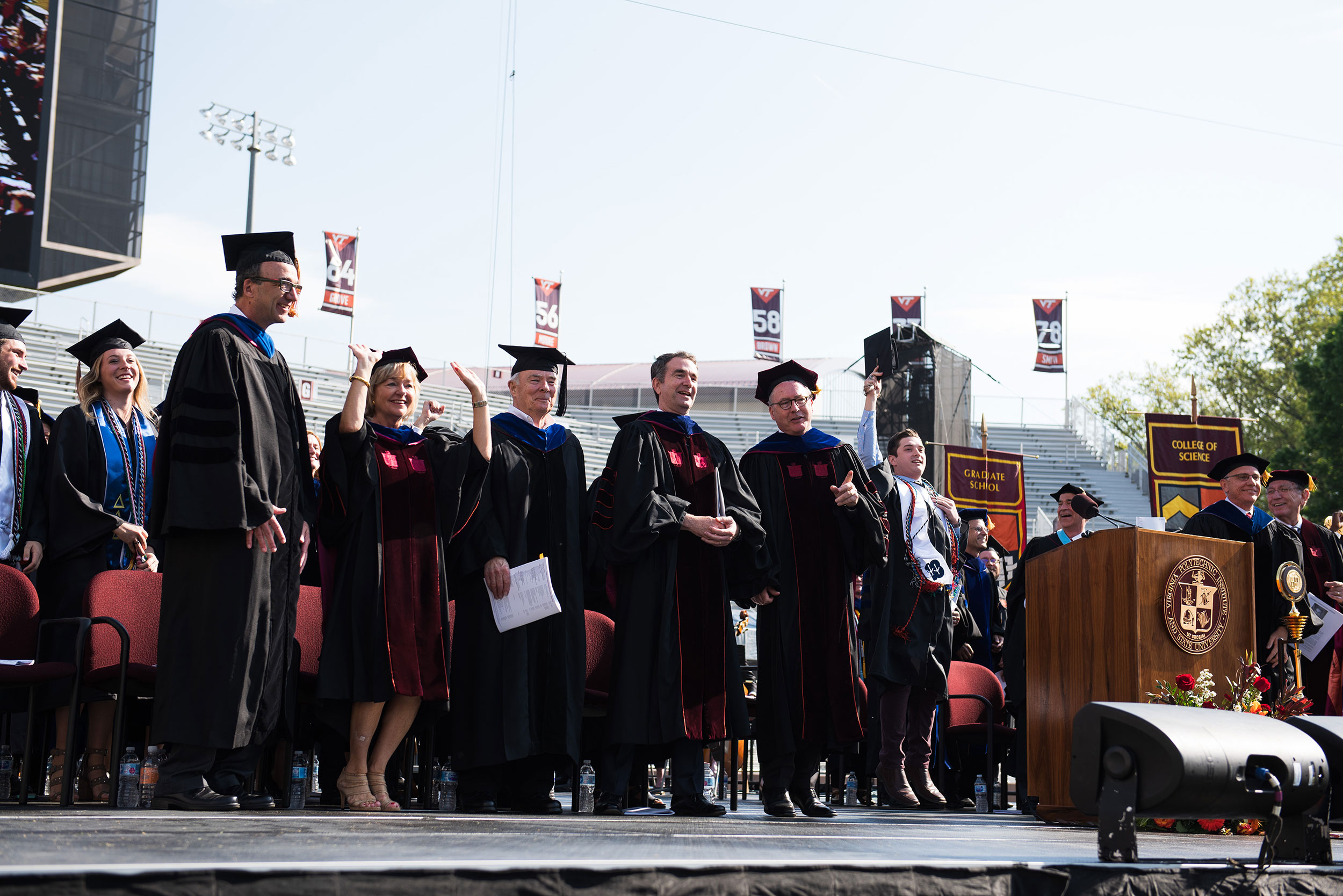 Tim Sands, president, Governor Ralph Northam, and stage party at commencement