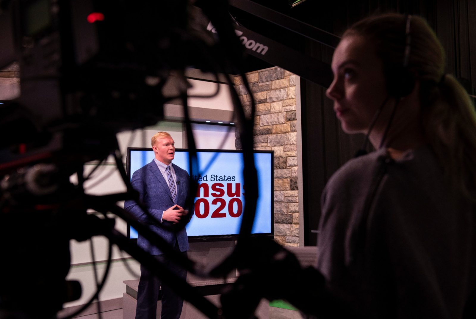 Student broadcasters in the news studio