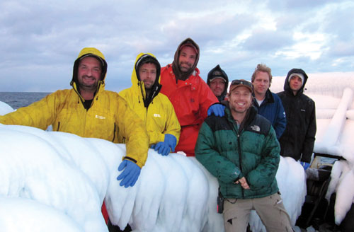 Kugelman with captain and crew of the Northwestern