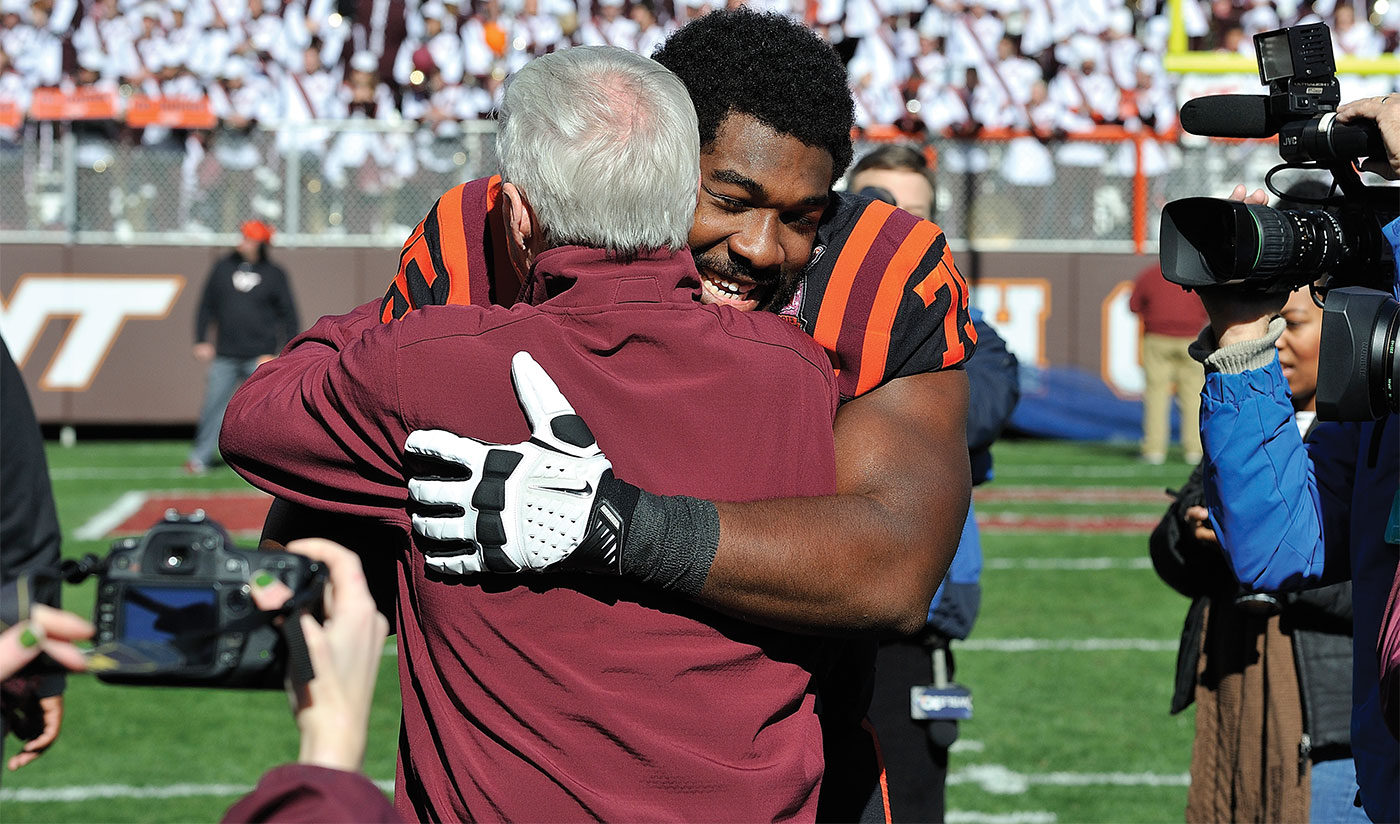 Virginia Tech football coach Frank Beamer and player